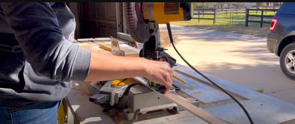 cutting the wood at a 45-degree angle at opposite ends