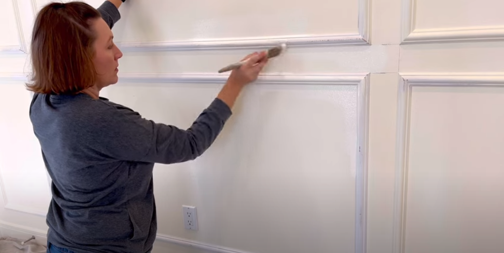 painting the frame the same color as the wall